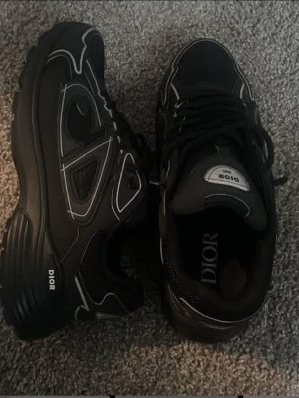 Dior Men’s Black Sneakers with White Stitch Accents